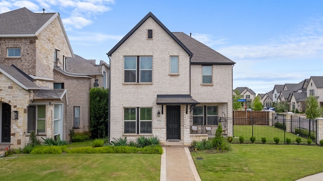 711 Prairie Falcon Dr, Arlington, TX 76005 - view of front facade with a residential view, roof with shingles, and brick siding