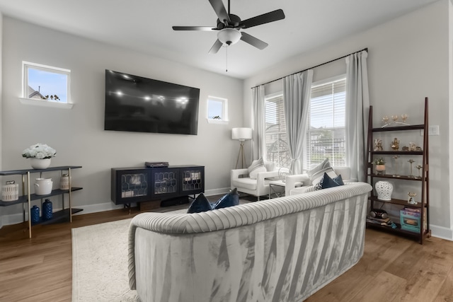 711 Prairie Falcon Dr, Arlington, TX 76005 - living area featuring plenty of natural light, a ceiling fan, and wood finished floors