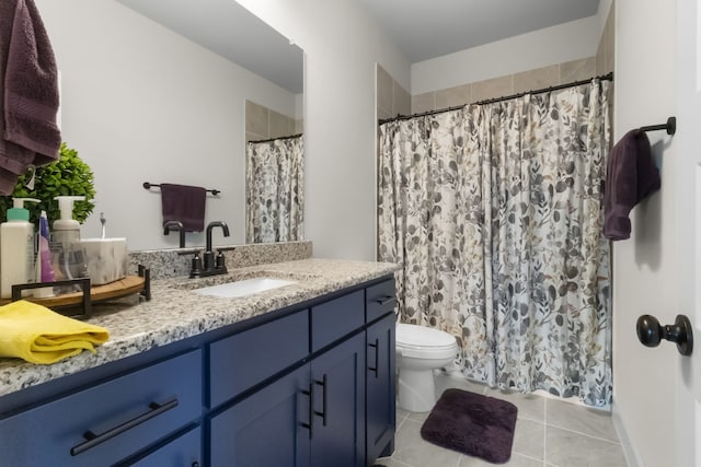 711 Prairie Falcon Dr, Arlington, TX 76005 - bathroom with vanity, tile patterned flooring, and curtained shower
