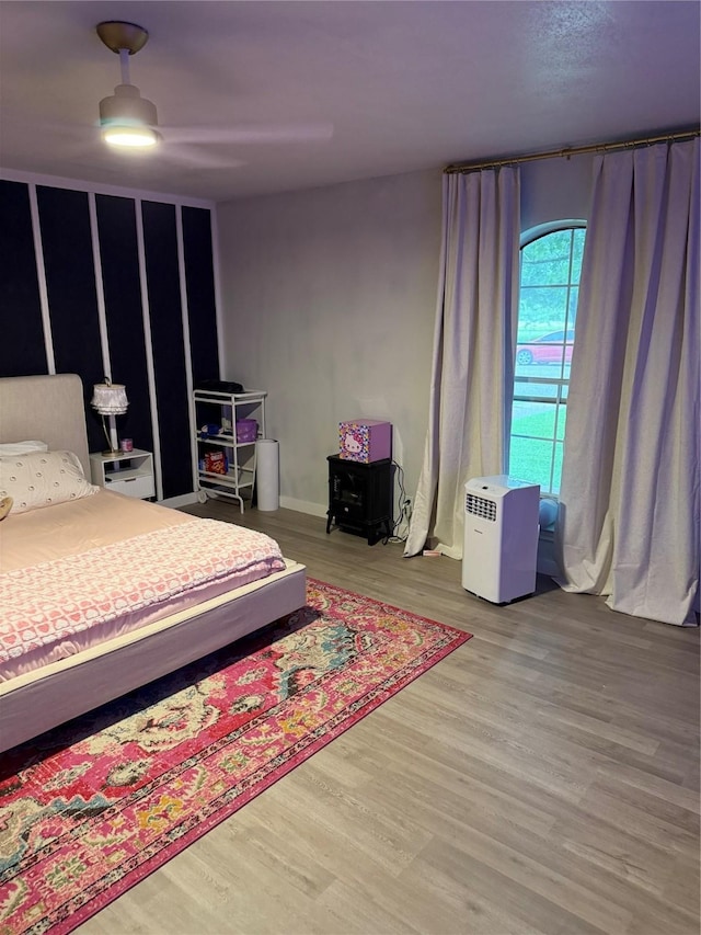 907 Dogwood St, Waco, TX 76706 - bedroom featuring wood finished floors