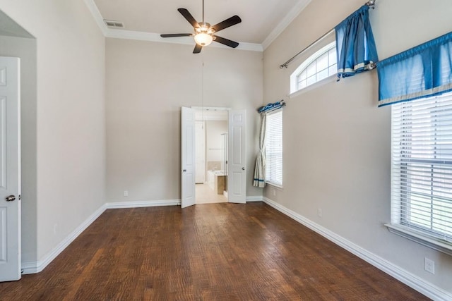 4517 Copeland Dr, Plano, TX 75024 - unfurnished bedroom featuring crown molding, wood finished floors, a high ceiling, a ceiling fan, and ensuite bathroom