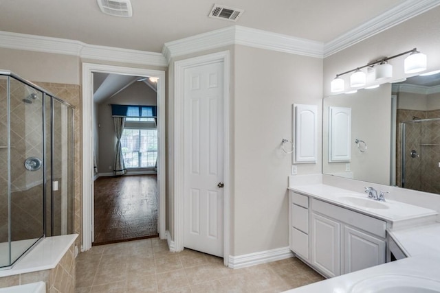4517 Copeland Dr, Plano, TX 75024 - full bathroom featuring vanity, a stall shower, tile patterned floors, and crown molding