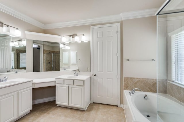4517 Copeland Dr, Plano, TX 75024 - bathroom with double vanity, a garden tub, tile patterned floors, a shower stall, and ornamental molding