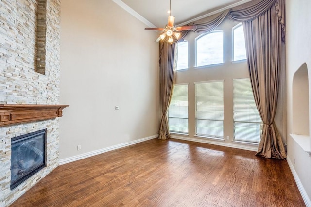 4517 Copeland Dr, Plano, TX 75024 - unfurnished living room with a ceiling fan, wood finished floors, a fireplace, and ornamental molding