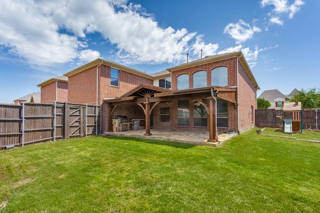 4517 Copeland Dr, Plano, TX 75024 - rear view of house featuring brick siding, a patio, a fenced backyard, and a gate