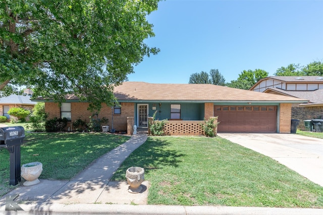 3826 Crest Way, Abilene, TX 79606 - single story home with a garage, a front lawn, brick siding, and driveway