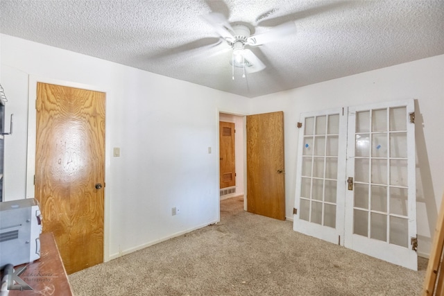 3826 Crest Way, Abilene, TX 79606 - unfurnished bedroom with carpet flooring, a textured ceiling, and a ceiling fan
