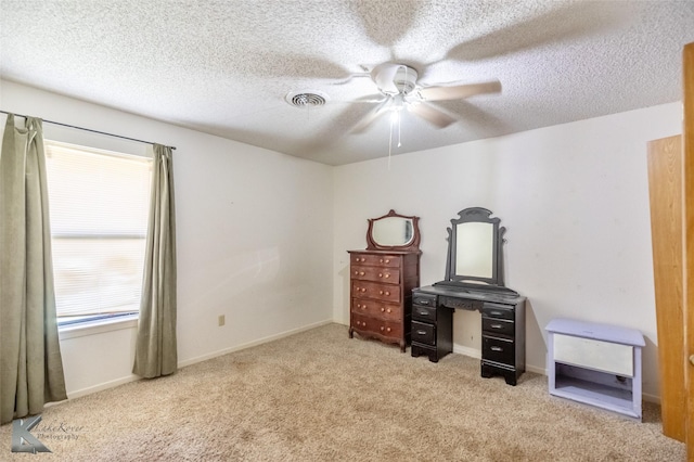 3826 Crest Way, Abilene, TX 79606 - unfurnished bedroom featuring carpet flooring, a textured ceiling, and a ceiling fan