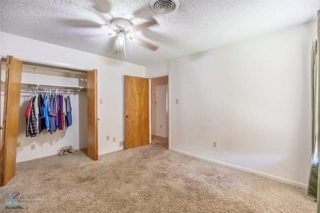 3826 Crest Way, Abilene, TX 79606 - unfurnished bedroom with carpet floors, a closet, a ceiling fan, and a textured ceiling