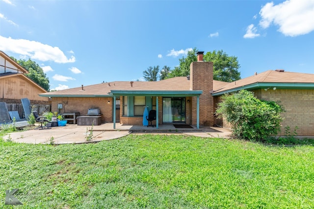 3826 Crest Way, Abilene, TX 79606 - rear view of property with a patio area, a chimney, a yard, and brick siding