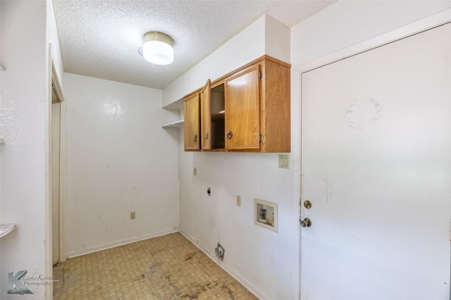 3826 Crest Way, Abilene, TX 79606 - washroom with electric dryer hookup, washer hookup, cabinet space, a textured ceiling, and light floors