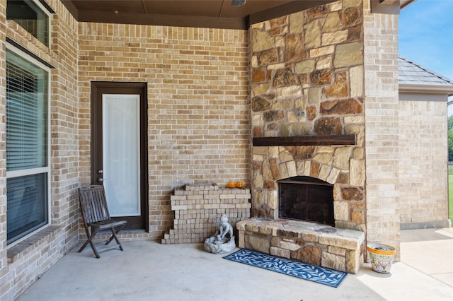 4513 Donnoli Dr, Flower Mound, TX 75022 - view of patio / terrace featuring an outdoor stone fireplace