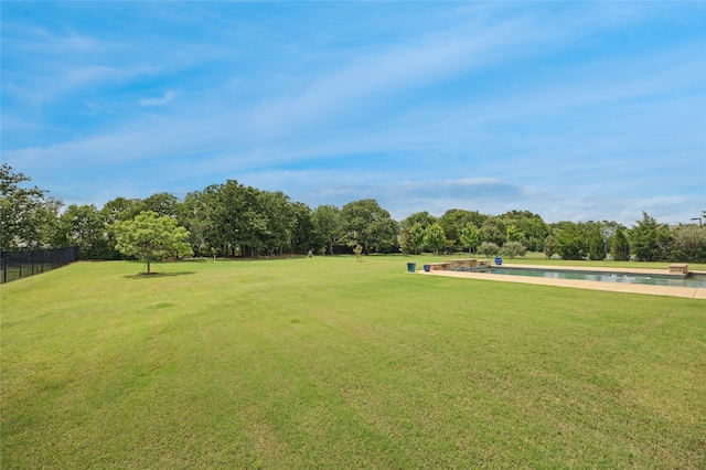 4513 Donnoli Dr, Flower Mound, TX 75022 - view of property's community featuring a pool and view of scattered trees