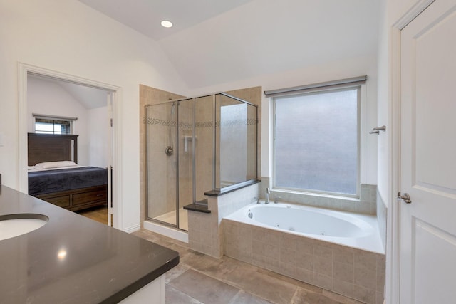 2464 Castle Ridge Dr, Richardson, TX 75080 - ensuite bathroom with lofted ceiling, a stall shower, a whirlpool tub, and vanity