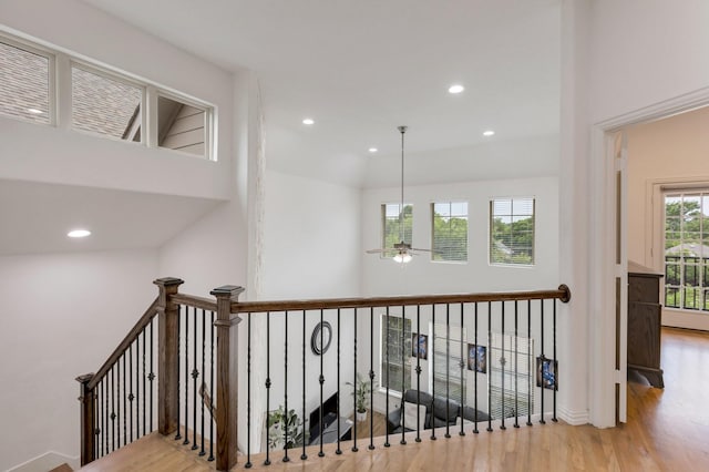 2464 Castle Ridge Dr, Richardson, TX 75080 - corridor featuring wood finished floors, recessed lighting, and an upstairs landing