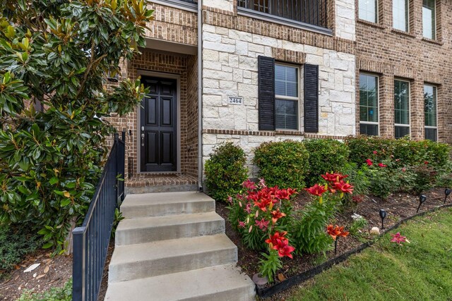 2464 Castle Ridge Dr, Richardson, TX 75080 - entrance to property with stone siding and brick siding