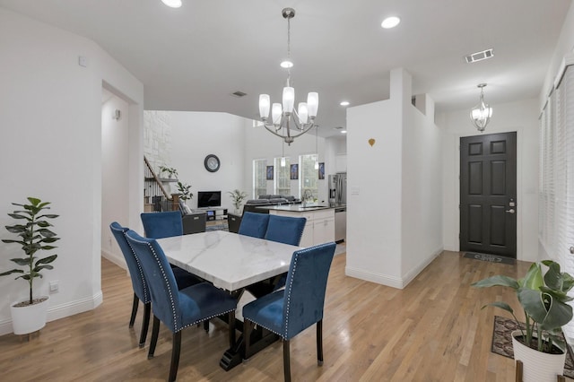 2464 Castle Ridge Dr, Richardson, TX 75080 - dining space with a chandelier, light wood-type flooring, and recessed lighting