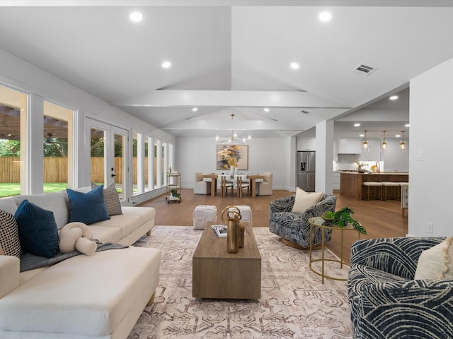 5832 Charlestown Dr, Dallas, TX 75230 - living area with light wood-style flooring, lofted ceiling, recessed lighting, and a chandelier