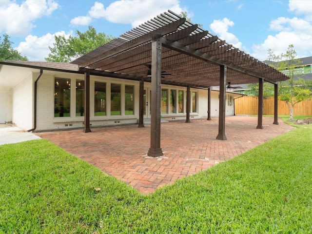5832 Charlestown Dr, Dallas, TX 75230 - back of property with a pergola, brick siding, a patio, and a ceiling fan