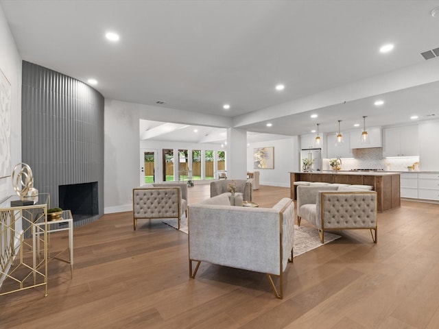 5832 Charlestown Dr, Dallas, TX 75230 - living area featuring light wood-style floors and recessed lighting