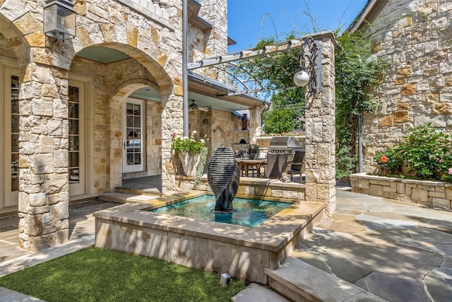 5800 Armstrong Pkwy, University Park, TX 75205 - view of patio featuring an outdoor kitchen and ceiling fan