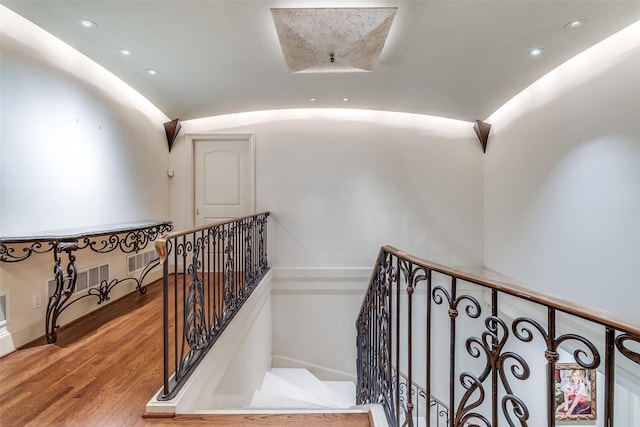 5800 Armstrong Pkwy, University Park, TX 75205 - stairway with wood finished floors, vaulted ceiling, and recessed lighting