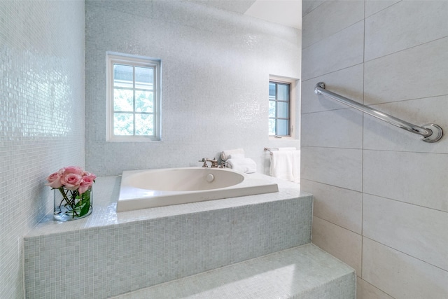 5800 Armstrong Pkwy, University Park, TX 75205 - bathroom with a garden tub and tile walls