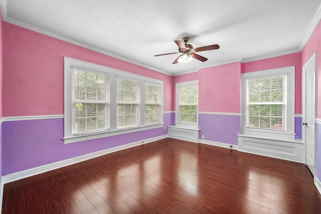 1301 W 2nd Ave, Corsicana, TX 75110 - spare room with a ceiling fan, crown molding, and wood finished floors