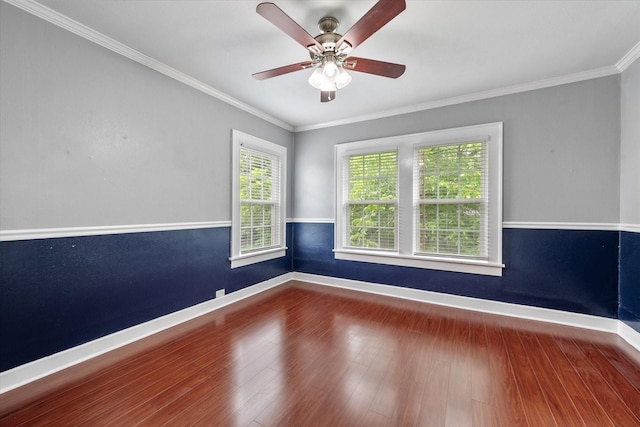 1301 W 2nd Ave, Corsicana, TX 75110 - spare room with wood finished floors, a ceiling fan, and crown molding