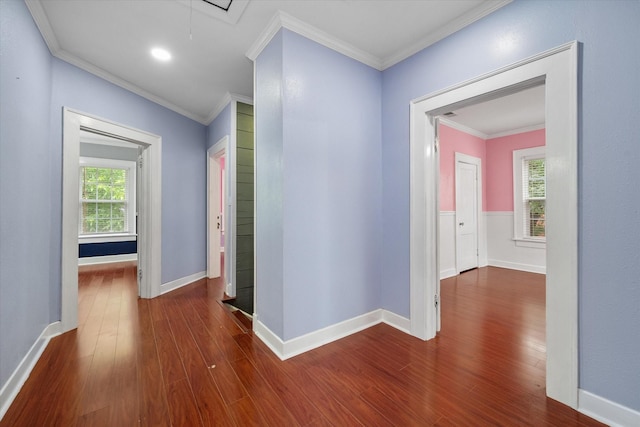 1301 W 2nd Ave, Corsicana, TX 75110 - hallway with wood finished floors, crown molding, and attic access