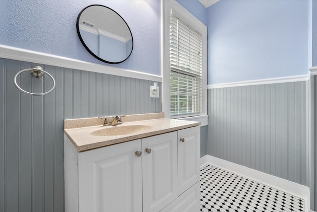 1301 W 2nd Ave, Corsicana, TX 75110 - bathroom featuring wainscoting and vanity