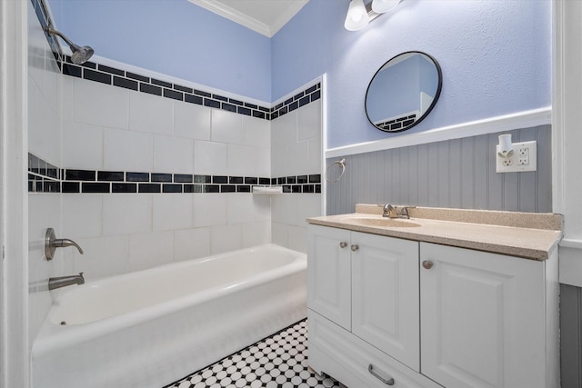 1301 W 2nd Ave, Corsicana, TX 75110 - full bathroom featuring vanity, tub / shower combination, crown molding, and a wainscoted wall
