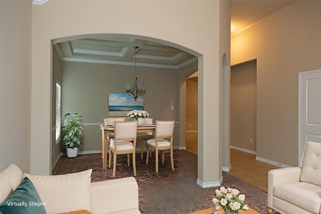 2400 Sabine Cir, Royse City, TX 75189 - living room with arched walkways, coffered ceiling, a chandelier, crown molding, and beam ceiling