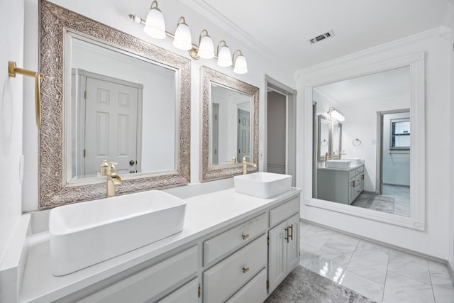 6209 Sierra Ct, Arlington, TX 76016 - bathroom with double vanity, marble look tiles, and ornamental molding