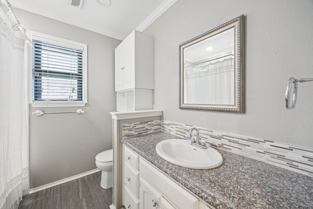 6209 Sierra Ct, Arlington, TX 76016 - full bathroom with decorative backsplash, vanity, wood finished floors, ornamental molding, and curtained shower