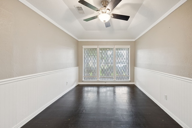 6209 Sierra Ct, Arlington, TX 76016 - unfurnished room featuring wood finished floors, a ceiling fan, and wainscoting