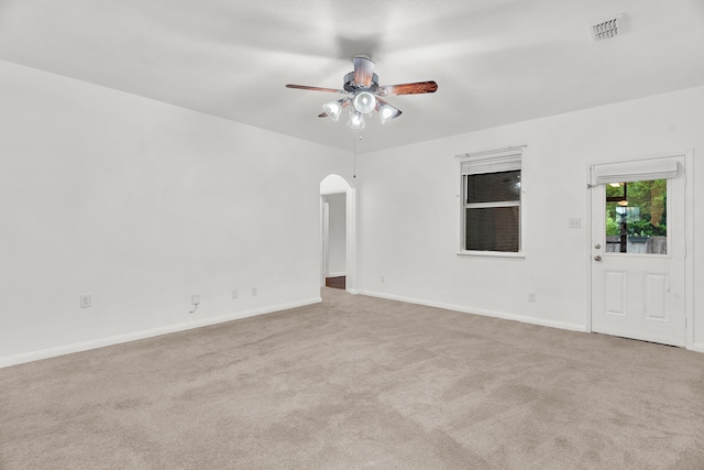 161 Collin St, Anna, TX 75409 - unfurnished room with a ceiling fan, arched walkways, and carpet flooring