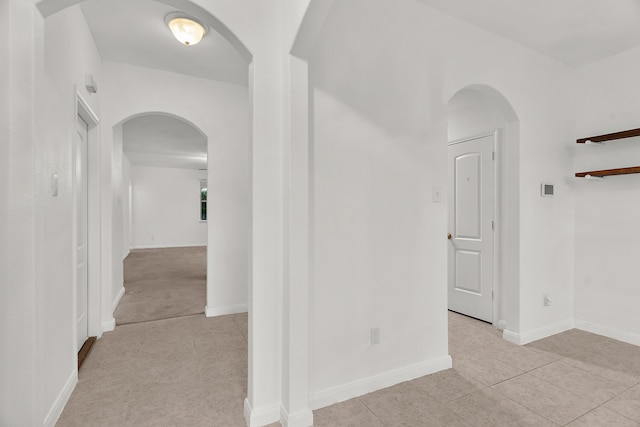 161 Collin St, Anna, TX 75409 - hall featuring arched walkways and light tile patterned floors