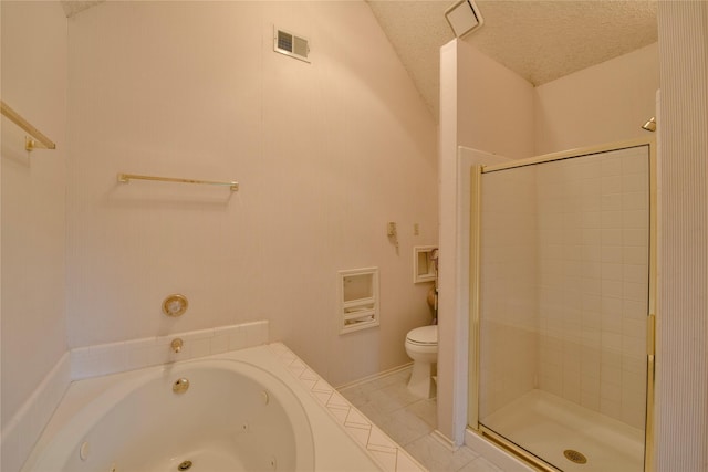 2315 Rockhill Rd, Mckinney, TX 75072 - bathroom featuring a shower stall, a textured ceiling, a tub with jets, and tile patterned floors