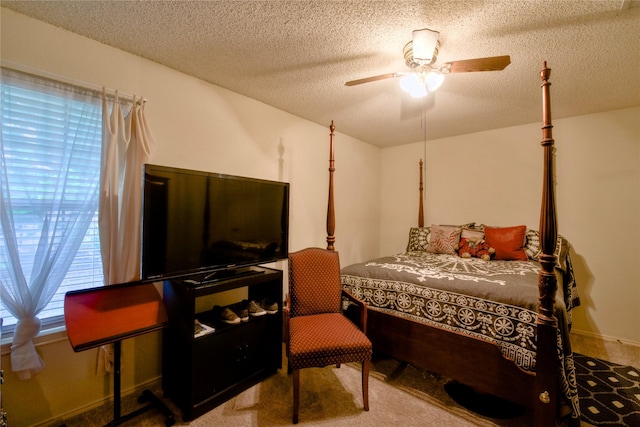 2315 Rockhill Rd, Mckinney, TX 75072 - bedroom with a textured ceiling, carpet, and a ceiling fan