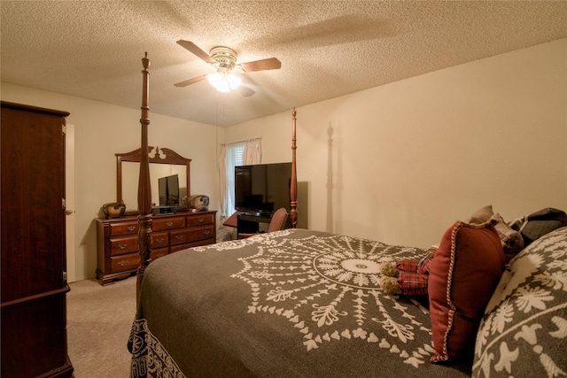 2315 Rockhill Rd, Mckinney, TX 75072 - bedroom with carpet floors, a textured ceiling, and ceiling fan