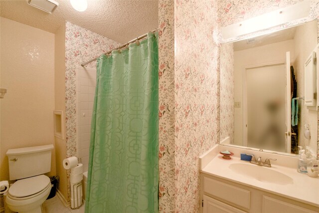 2315 Rockhill Rd, Mckinney, TX 75072 - bathroom with vanity, a textured ceiling, a shower with shower curtain, and wallpapered walls