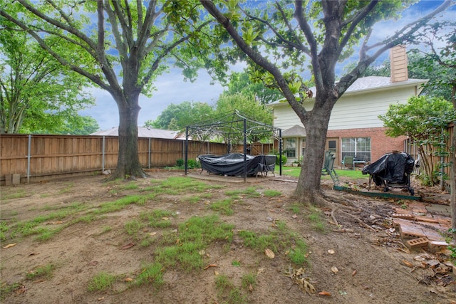 2315 Rockhill Rd, Mckinney, TX 75072 - fenced backyard featuring a gazebo