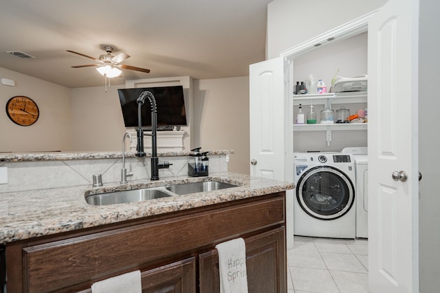 680 Navasota Dr, Crandall, TX 75114 - laundry area featuring a ceiling fan, light tile patterned flooring, and independent washer and dryer