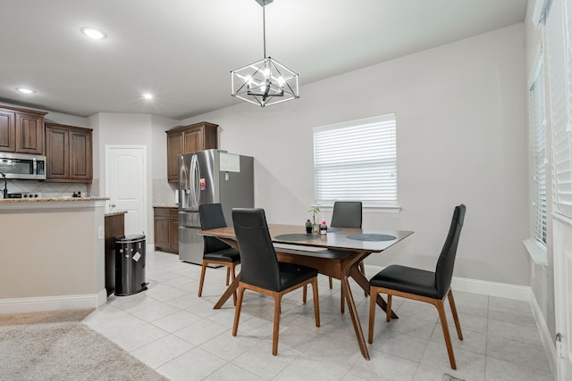 680 Navasota Dr, Crandall, TX 75114 - dining area with a chandelier, recessed lighting, and light tile patterned flooring