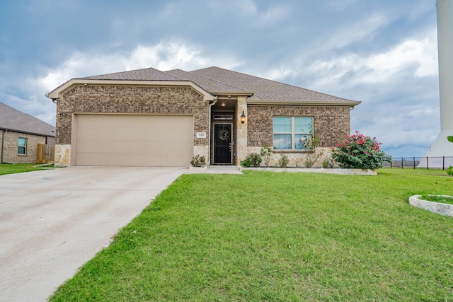 680 Navasota Dr, Crandall, TX 75114 - view of front of property featuring concrete driveway, an attached garage, brick siding, and a shingled roof