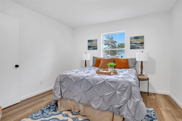 108 Fannin Dr, Euless, TX 76039 - bedroom featuring wood finished floors and baseboards
