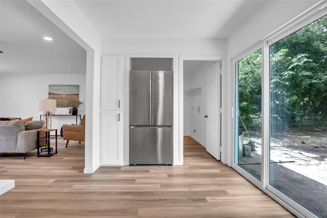 108 Fannin Dr, Euless, TX 76039 - kitchen with freestanding refrigerator, light wood-type flooring, and recessed lighting