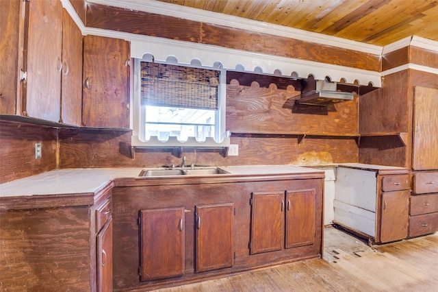 811 Tarryall Dr, Dallas, TX 75224 - kitchen featuring crown molding, wood ceiling, light wood-style floors, light countertops, and brown cabinetry