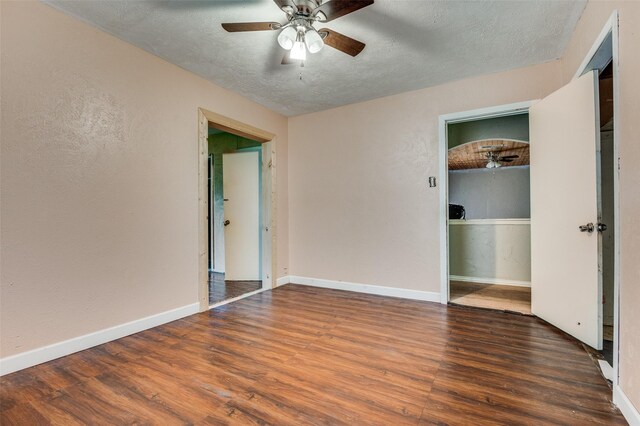 811 Tarryall Dr, Dallas, TX 75224 - empty room featuring wood finished floors, ceiling fan, a textured ceiling, and a textured wall
